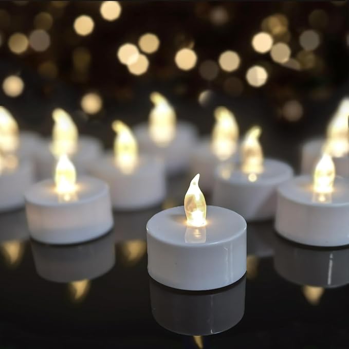 12 Pack Realistic and Bright Flickering Battery Operated Flameless LED Tea Lights Candles,Electric Fake Candle in Warm White Perfect for Valentines Day, Halloween, Christmas, Birthday Decoration[Energy Class A]