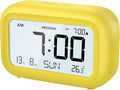 DOOMAY Digital Alarm Clock Bedside - Battery Powered Clock with LCD Display Volume Adjustable Snooze and Weekend Mode for Bedroom Office Desk Travel (Yellow)