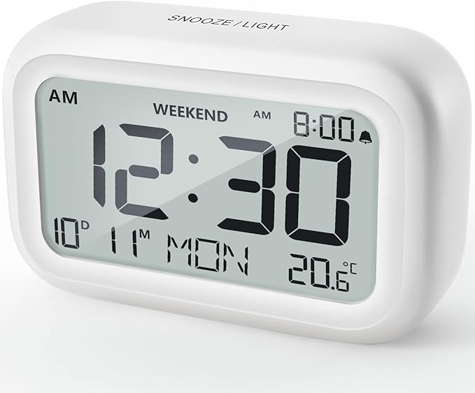 DOOMAY Digital Alarm Clock Bedside - Battery Powered Clock with LCD Display Volume Adjustable Snooze and Weekend Mode for Bedroom Office Desk Travel